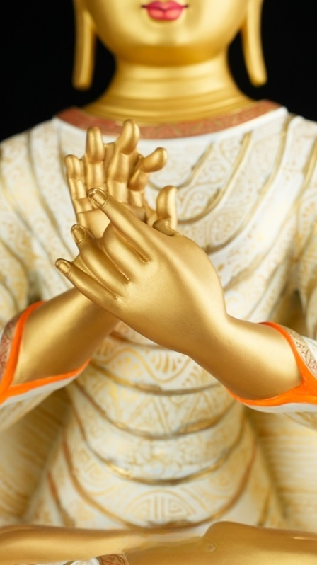 Handcrafted Tibetan Buddhist Maitreya Buddha statue finished with mud-gold detailing and mineral pigments, symbolizing joy, compassion, and future enlightenment.