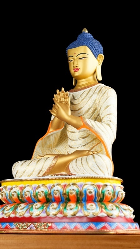 Hand-painted Maitreya Buddha statue using traditional mud-gold technique, showcasing authentic Tibetan Buddhist statues craftsmanship.