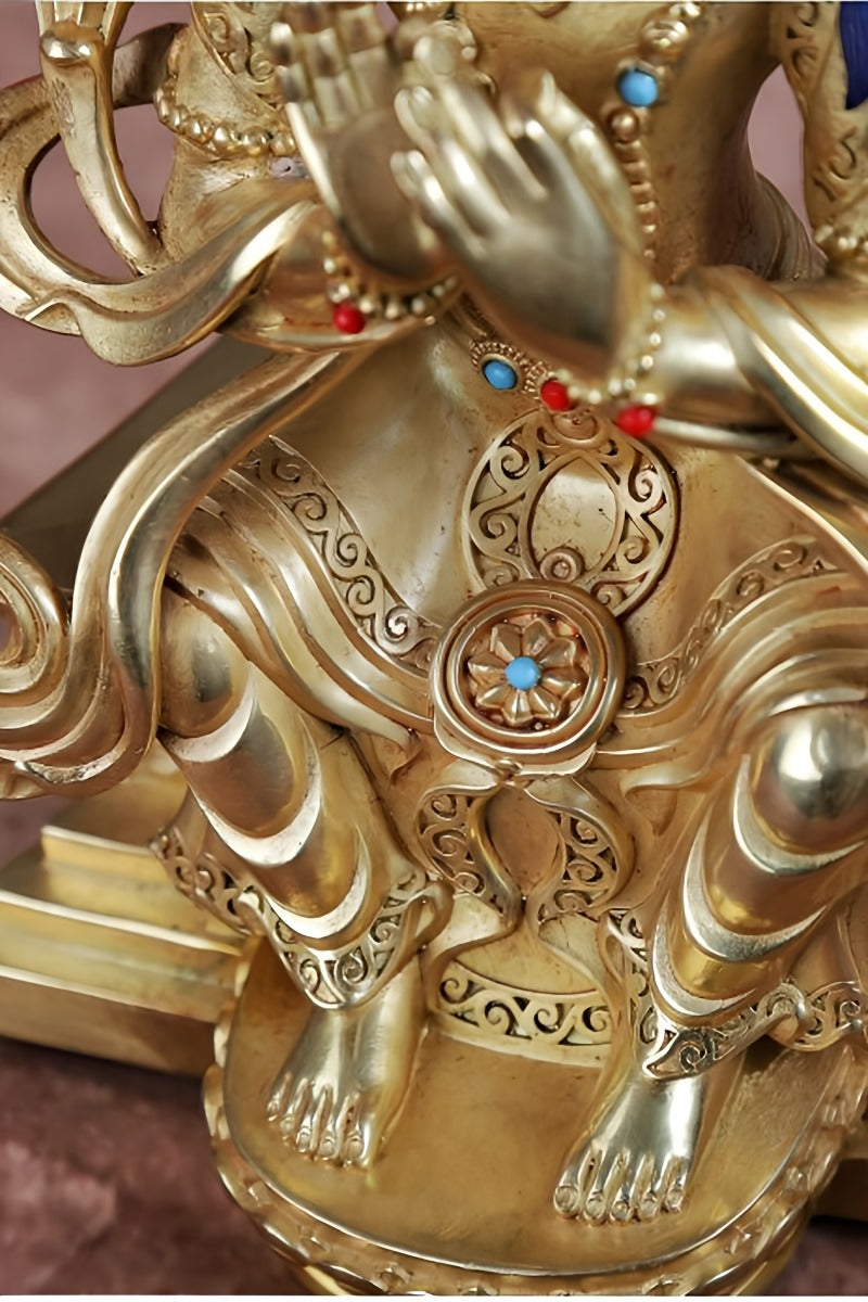 Painted Maitreya Buddha statue in brass, showcasing Tibetan Buddhist culture and the peaceful nature of Maitreya