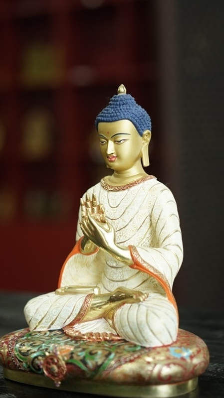 Fully handcrafted Tibetan Buddhist Maitreya Buddha statue with elegant mud-gold detailing, ideal for home shrines and meditation spaces.