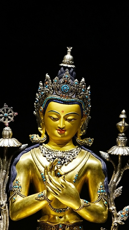 Handcrafted silver Maitreya Buddha statue with gilded finish, representing authentic Tibetan Buddha Statue-Art craftsmanship.