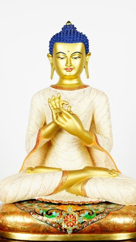 Traditional mud-gold Maitreya Buddha statue reflecting classic Tibetan Buddhist art and sacred symbolism.