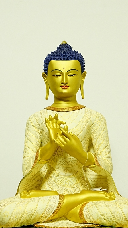 Traditional Tibetan Maitreya Buddha statue in mud-gold finish, ideal spiritual decor for meditation and sacred spaces.
