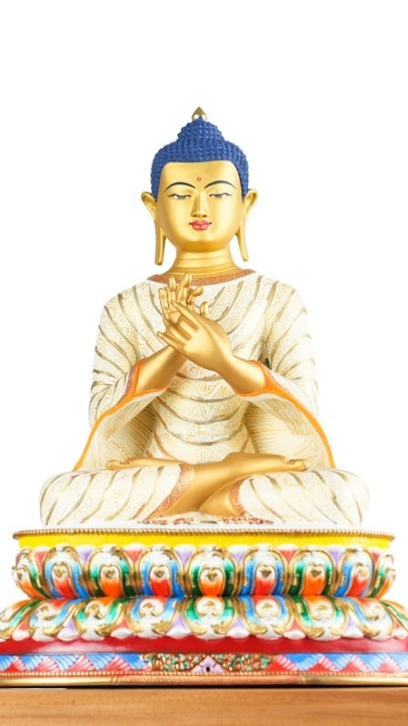 Traditional mud-gold Maitreya Buddha statue reflecting classic Tibetan Buddhist art and sacred symbolism.