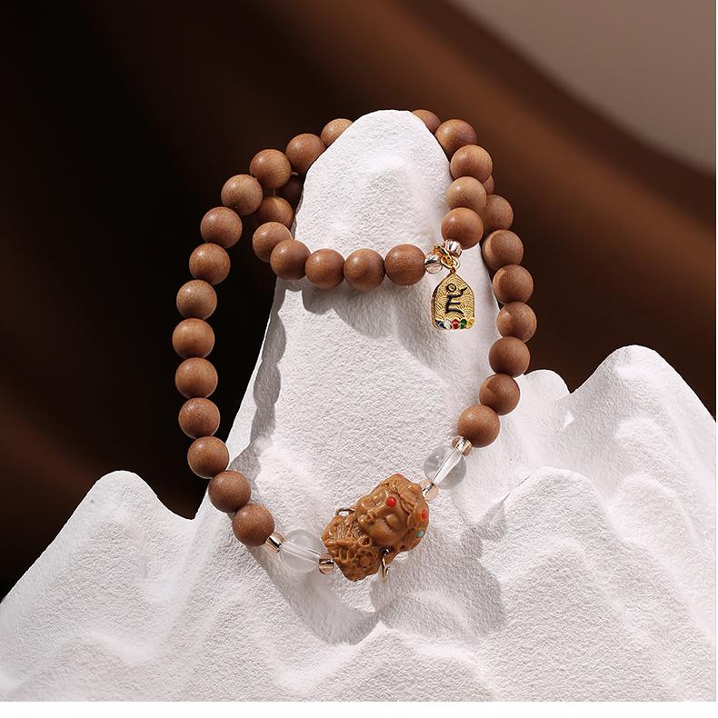 Tibetan-Buddhist sandalwood prayer beads multi-layer bracelet with glass and copper accents