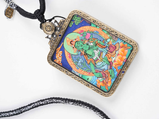 Handcrafted Tibetan thangka hanging of Manjushri, the Bodhisattva of Wisdom, zodiac protector amulet painted with natural mineral pigments.