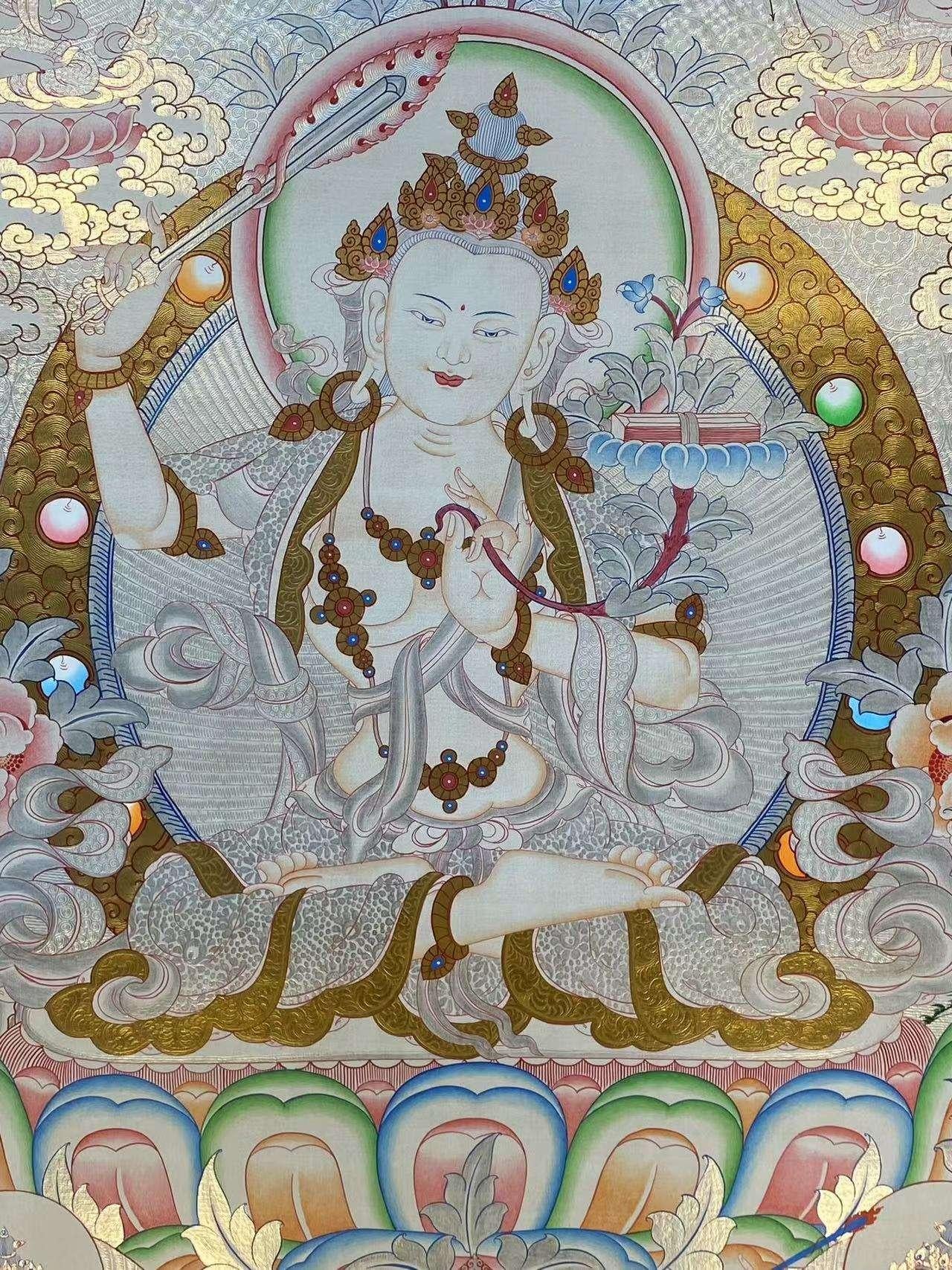 Exquisite Manjushri Tibetan thangka hand-painted on cloth, traditional sacred Buddhist artwork.