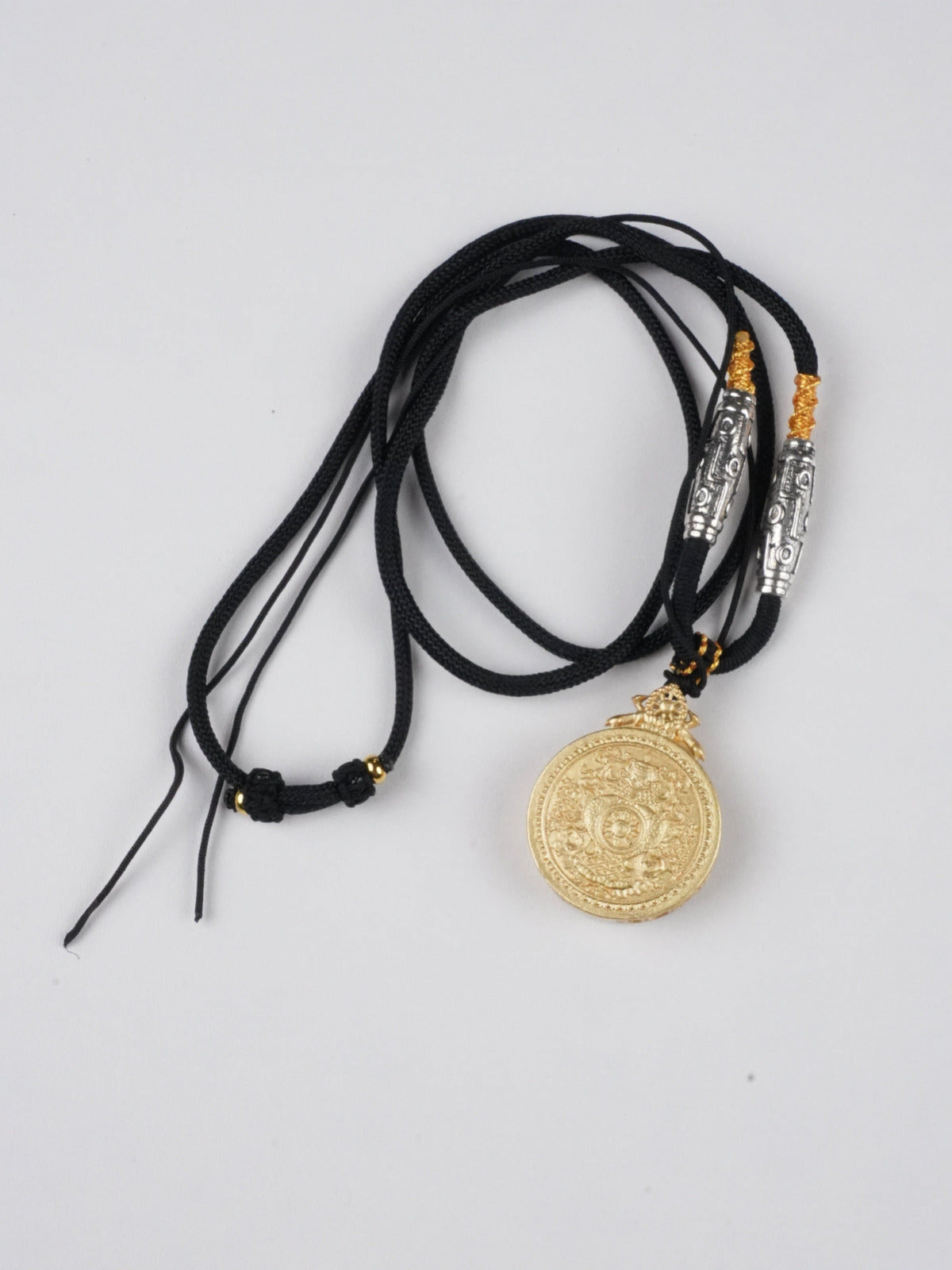 Tibetan Buddha art miniature Vajrapani thangka amulet, handcrafted pendant representing the protector deity in traditional Tibetan Buddhist style.