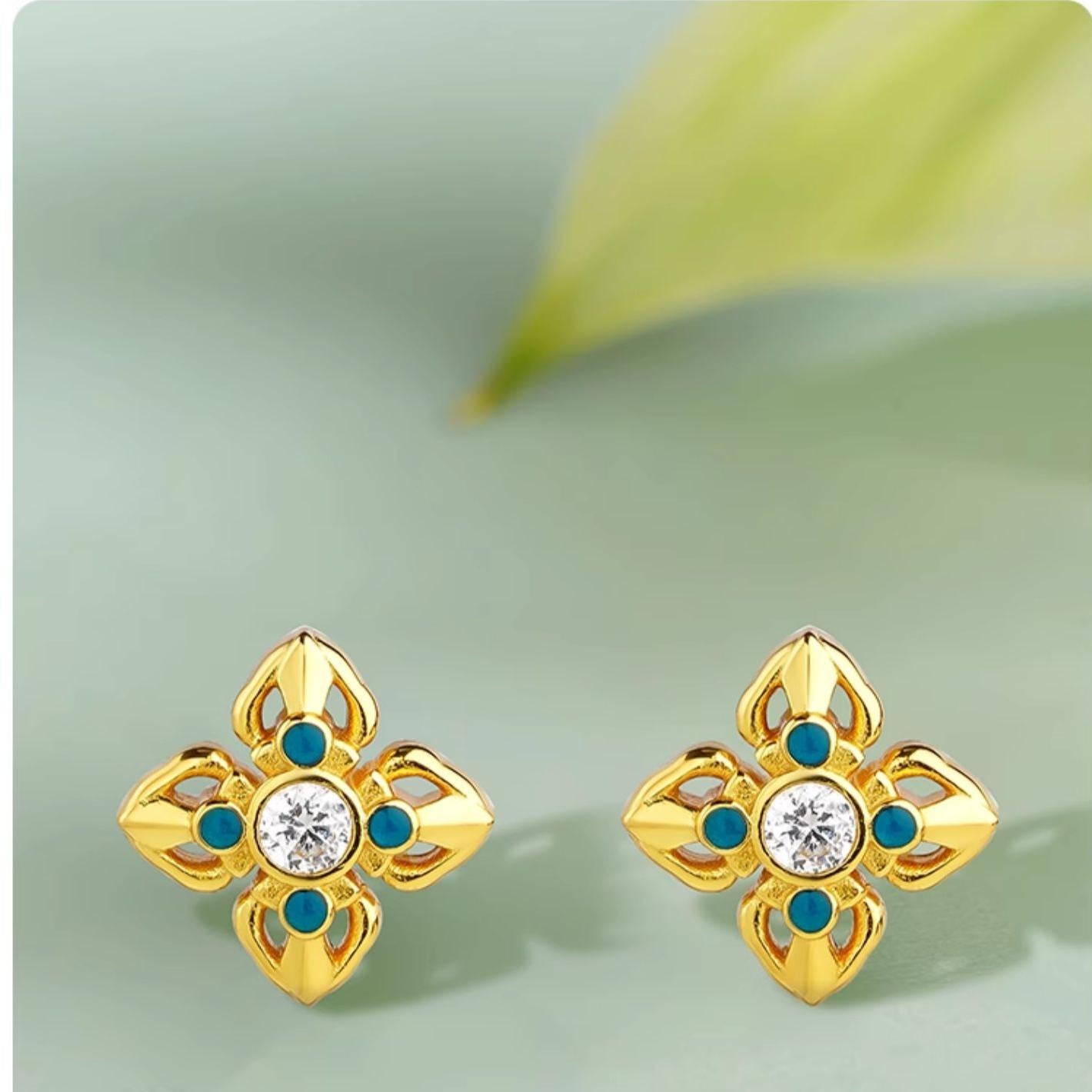 Square-shaped Tibetan Buddhist earrings made of sterling silver and zirconia for spiritual protection.