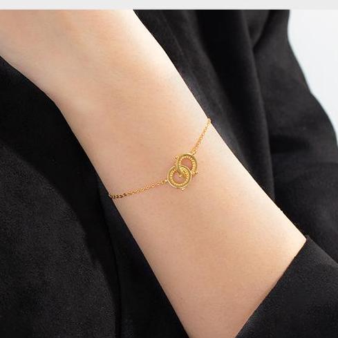 "Artisan-crafted 925 silver bracelet with gold plating, featuring a mountain-water design symbolizing mutual support and connection."