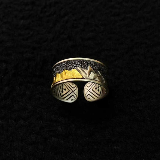 Handcrafted Namjagbarwa mountain ring made of solid gold and silver with fine inlay craftsmanship.