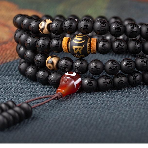 Tibetan Buddhist handcrafted obsidian 108 beads mala with six-syllable mantra bead and pendant.
