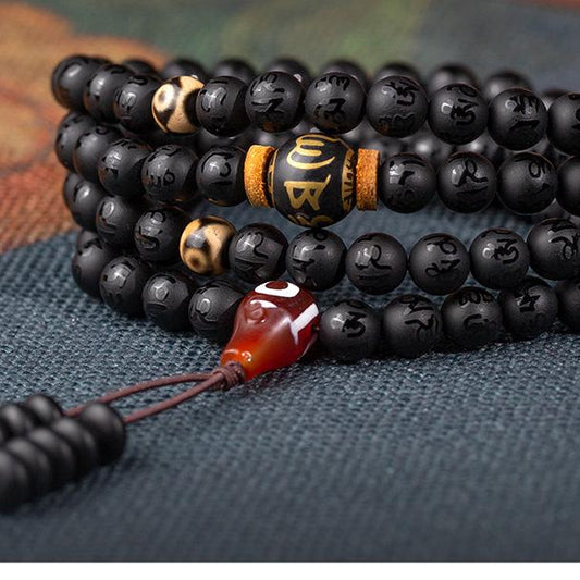 Tibetan Buddhist handcrafted obsidian 108 beads mala with six-syllable mantra bead and pendant.