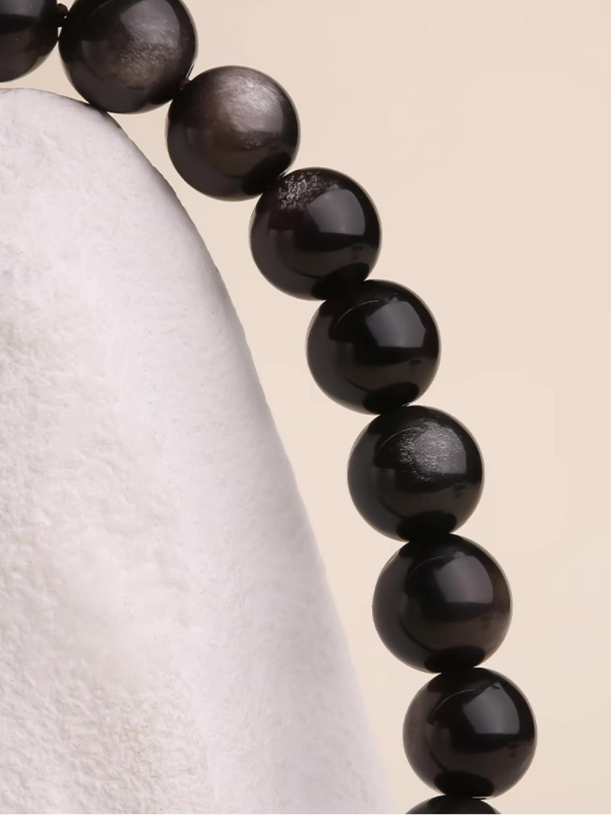 Xingye Tibetan-Buddhist obsidian bracelet inspired by starry-night themes with sterling silver mantra bead craftsmanship.