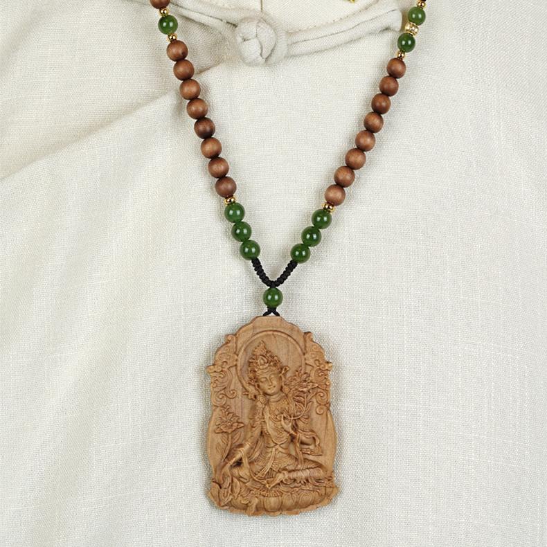 Tibetan amber and sandalwood necklace, ideal for meditation, balance, and mindfulness.