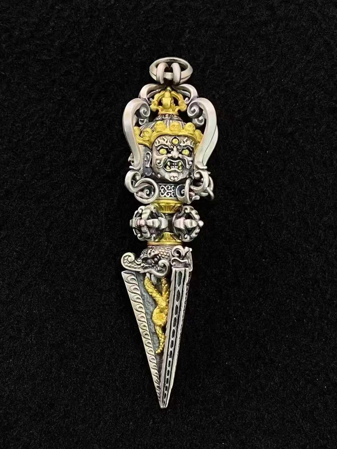 S925 sterling silver Phurba dagger pendant featuring detailed sacred Tibetan Buddhist design.