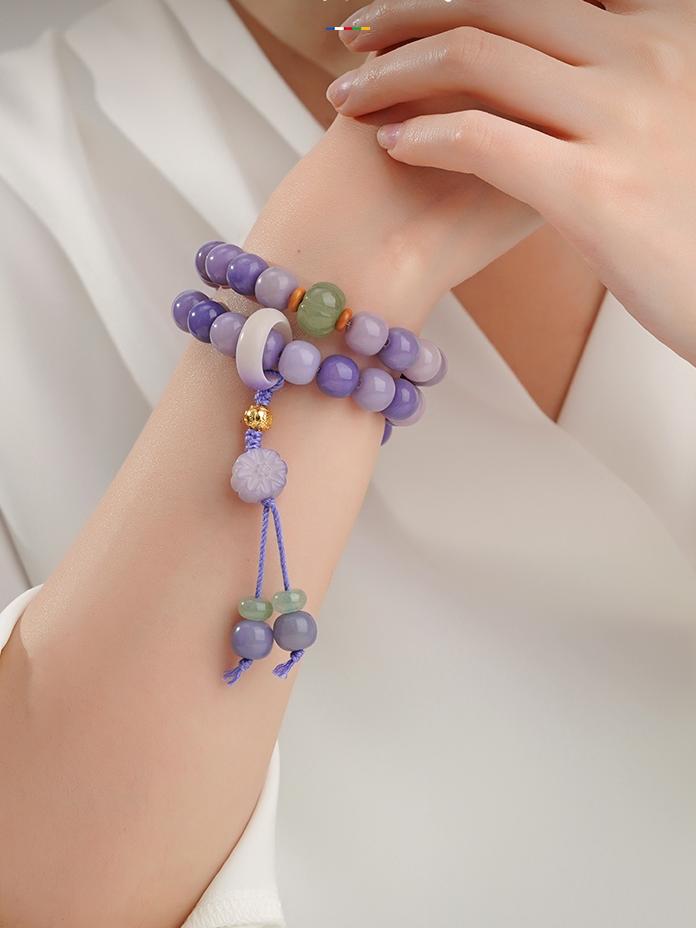 Tibetan-Buddhist Bodhi beads bracelet featuring silver six-syllable mantra bead