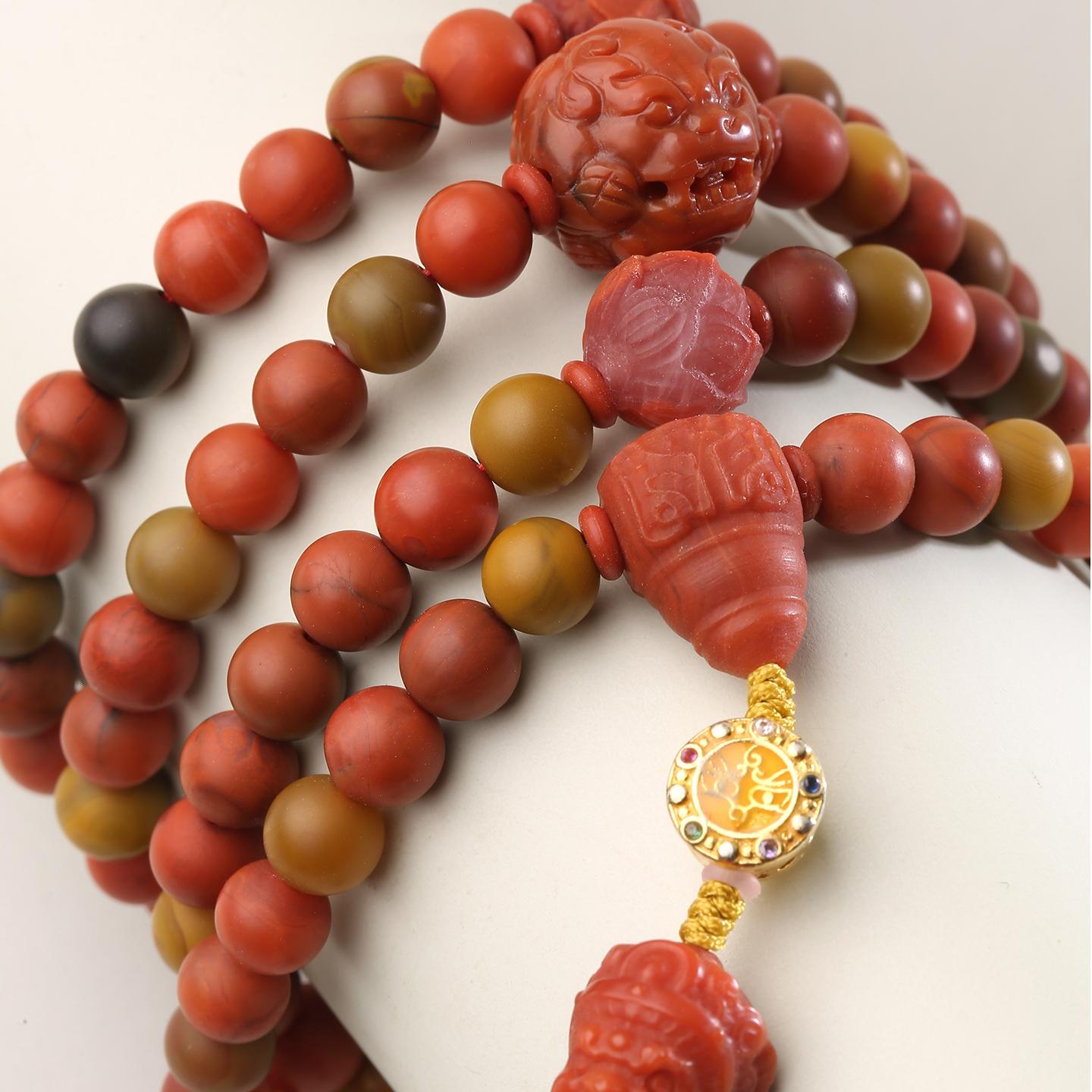 Purely handmade Tibetan Buddhist South Red Agate mala, crafted for peace, protection, and success.