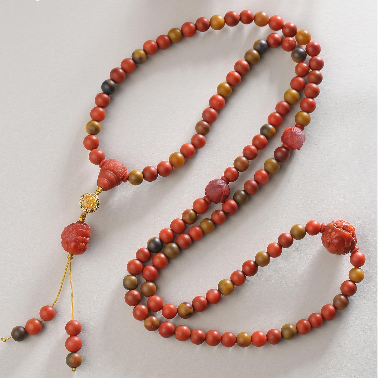 Tibetan BoShan Red Agate 108 beads bracelet, hand-polished with 925 silver for spiritual balance.