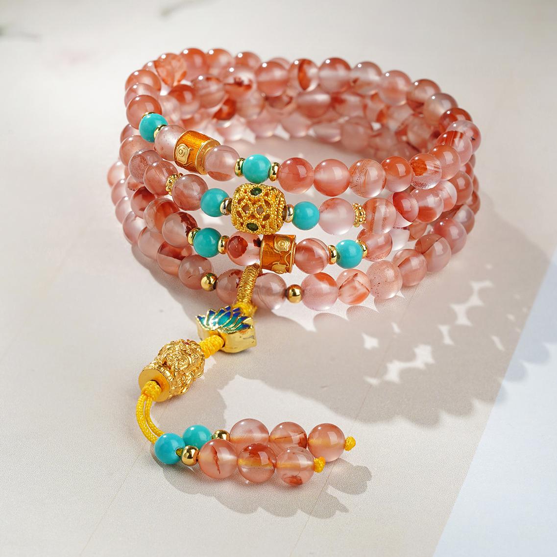 Tibetan Buddhist red agate 108 beads mala necklace handcrafted with copper and glass elements.