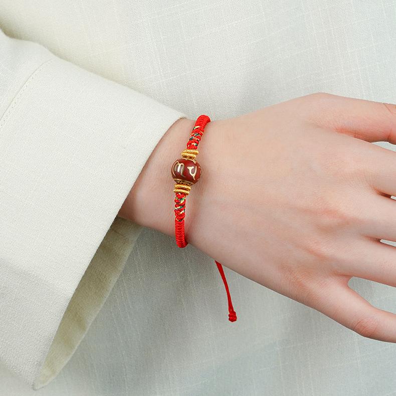Spiritual red string bracelet with Tibetan incense ash bead and mantra design