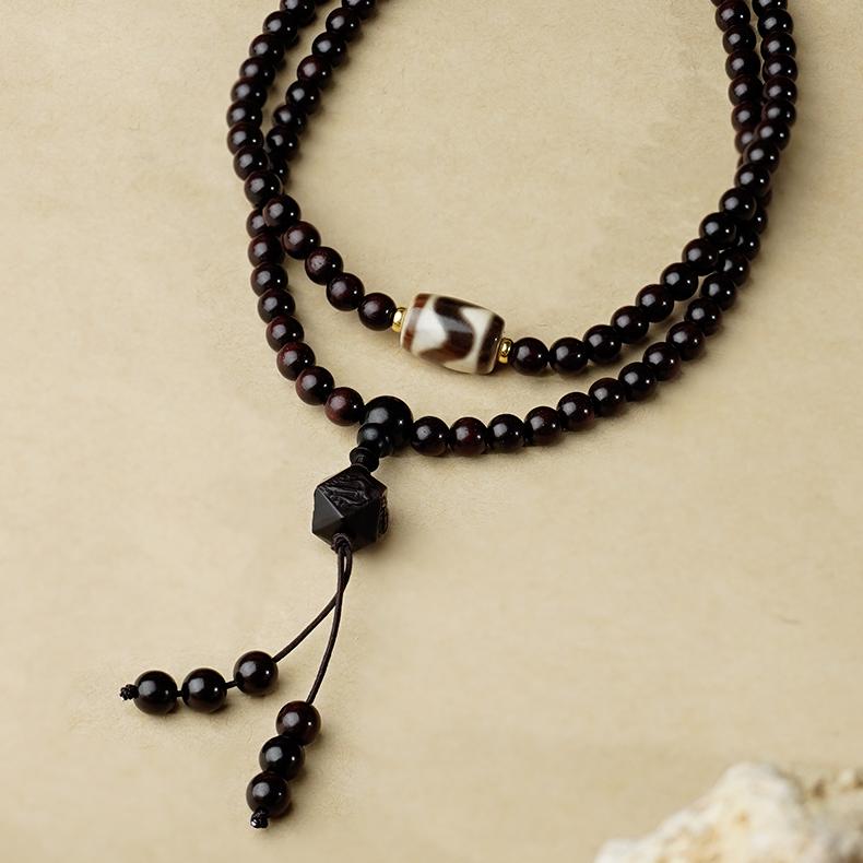 Amber and red sandalwood 108 beads mala symbolizing wisdom and tranquility