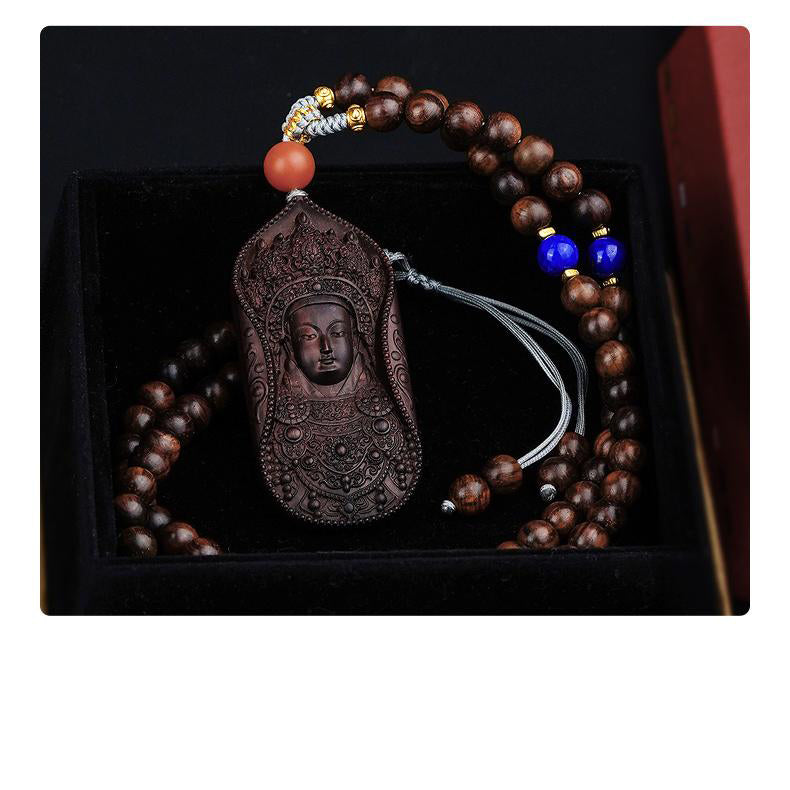 Red sandalwood Bodhisattva pendant necklace promoting serenity and spiritual strength.
