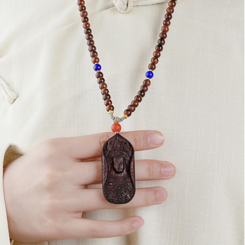 Tibetan Buddhist handcrafted necklace featuring Avalokiteshvara and 925 silver details.