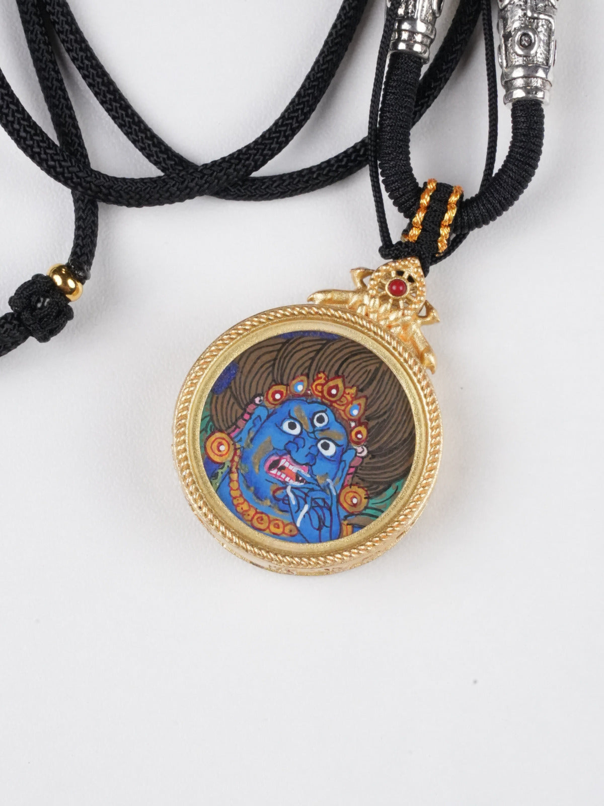 Round Tibetan Vajrapani Gao box necklace, pure hand-painted Buddha art on thangka fabric symbolizing power and protection.