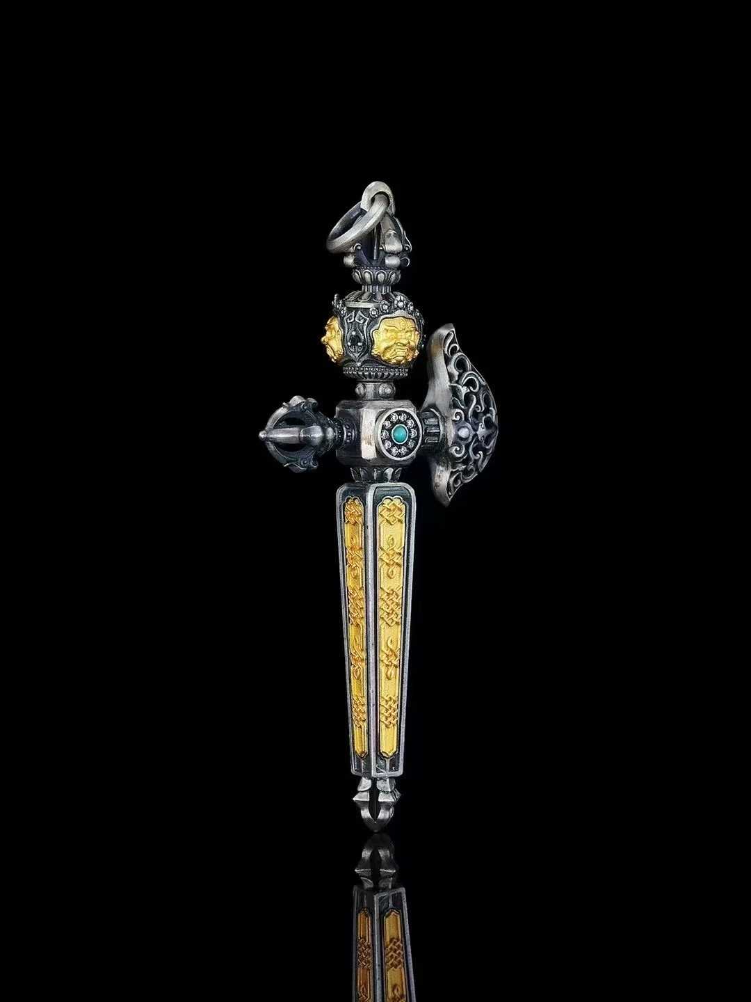 High-quality handcrafted S925 silver Mahakala Phurba ritual axe pendant inspired by Tibetan spiritual art.