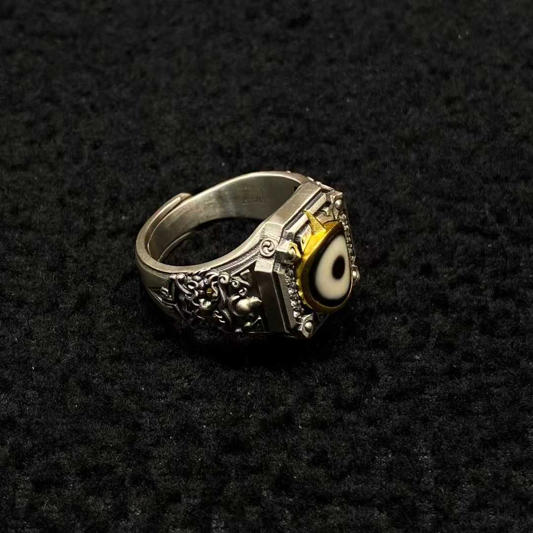 Handmade Zhiba Zha sacred ring in S925 silver showcasing rich patina and refined craftsmanship.