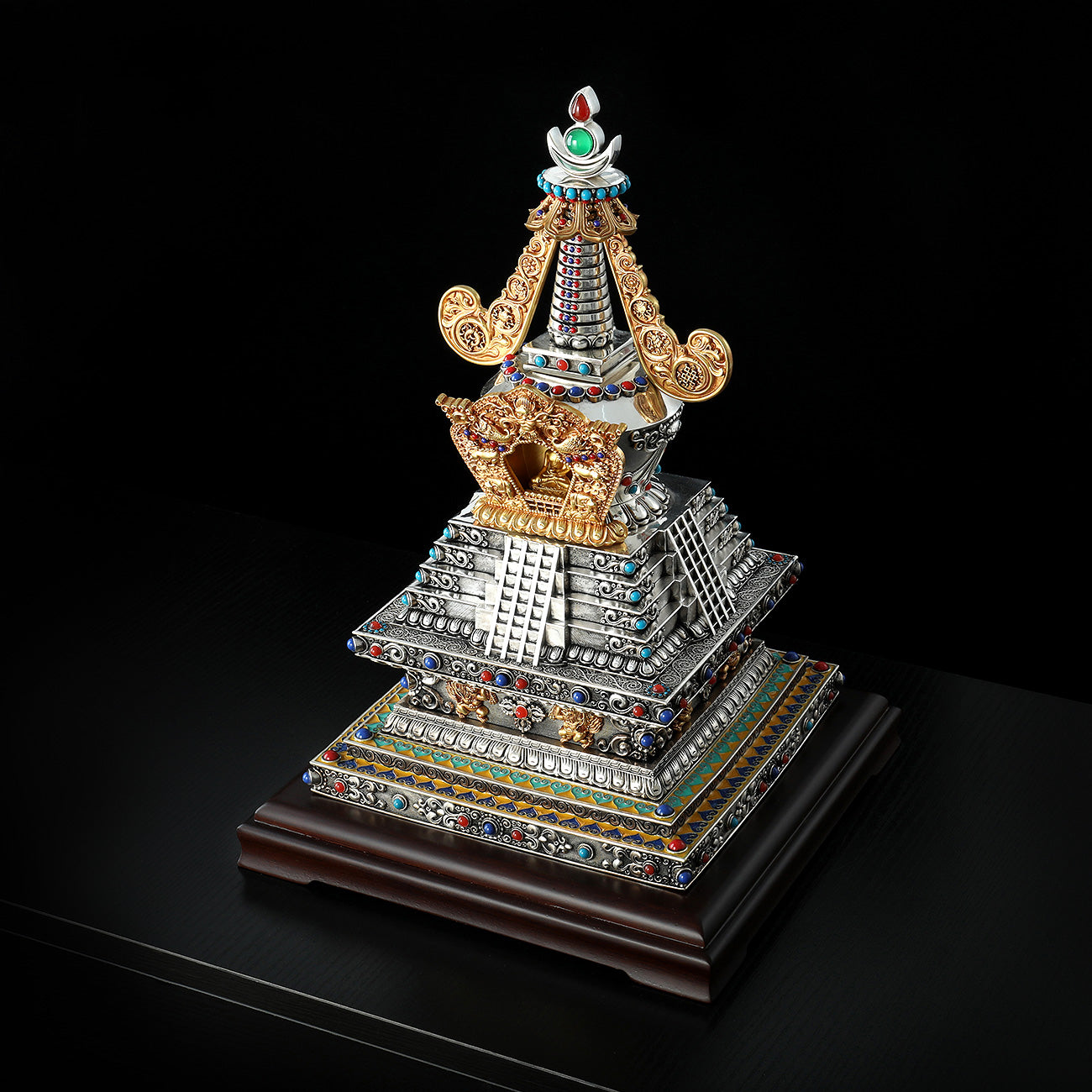 Artisan-made Heaven Descent Stupa ornament in brass and white bronze with traditional Tibetan gilding.

