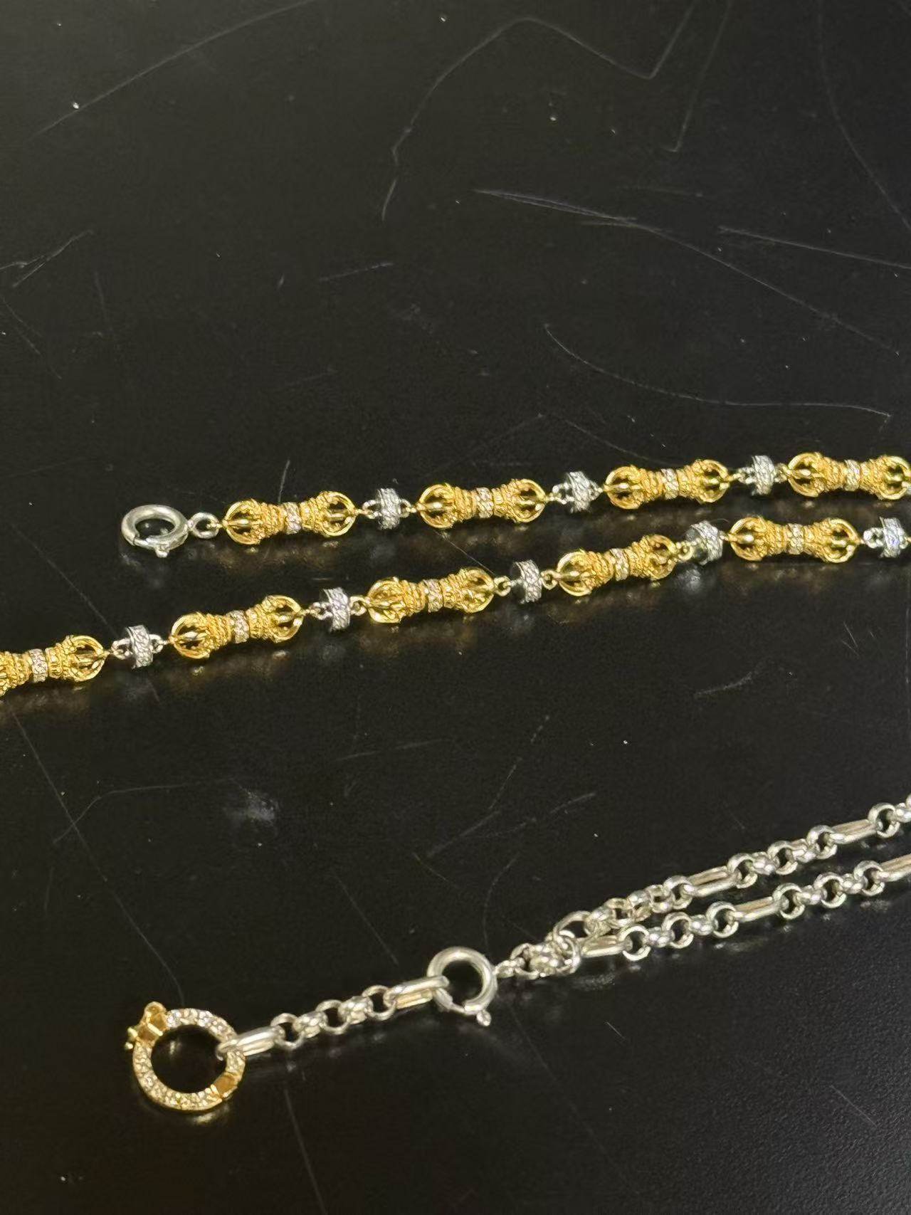 Exquisite Buddhist sacrificial items art featuring a hand-carved silver-gilded Vajra scepter with intricate spiritual motifs.