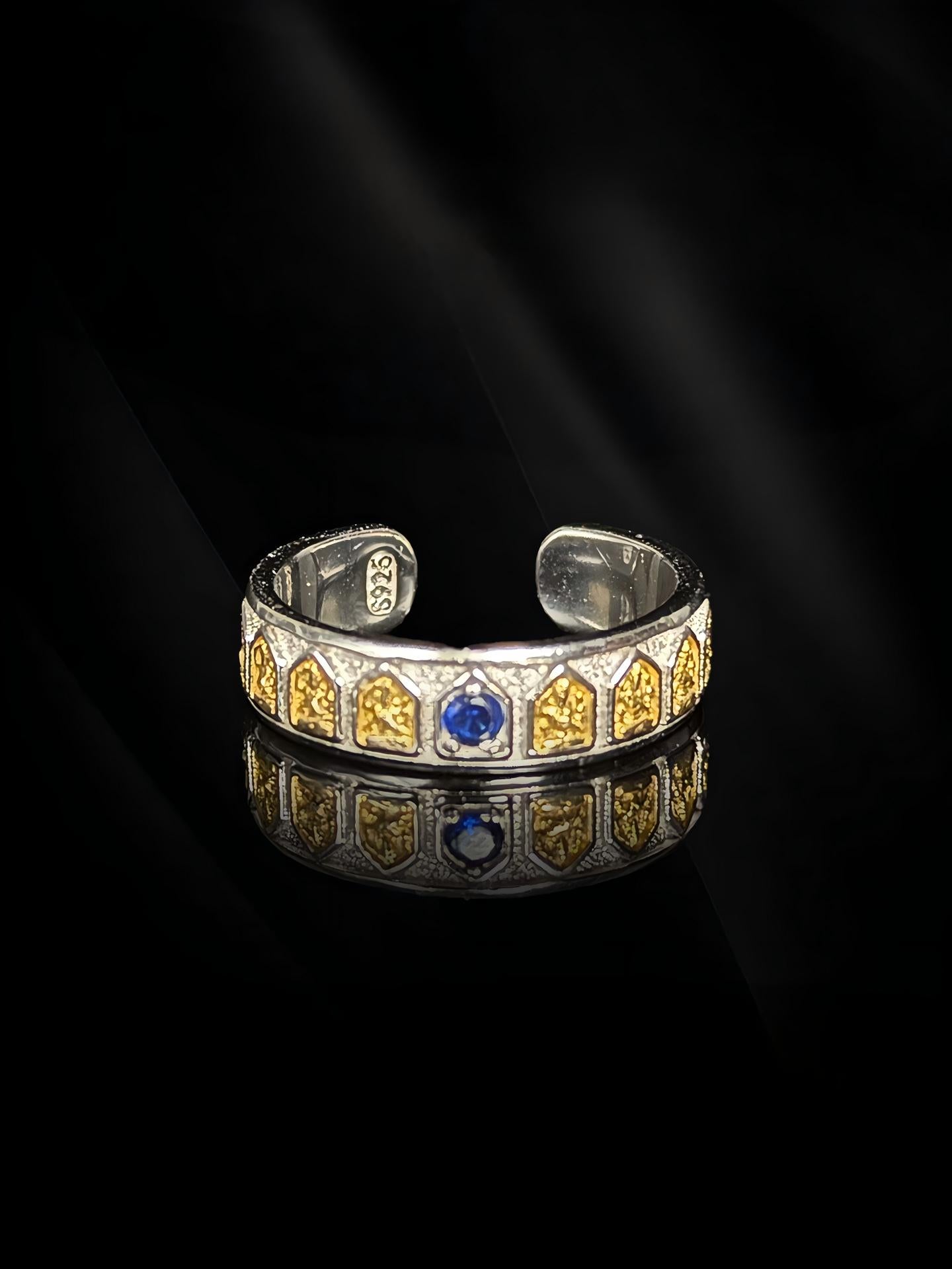 Exquisite Buddhist sacrificial items art featuring a hand-carved Manjusri seed syllable (Dhih) and the sword of wisdom on a silver band.
