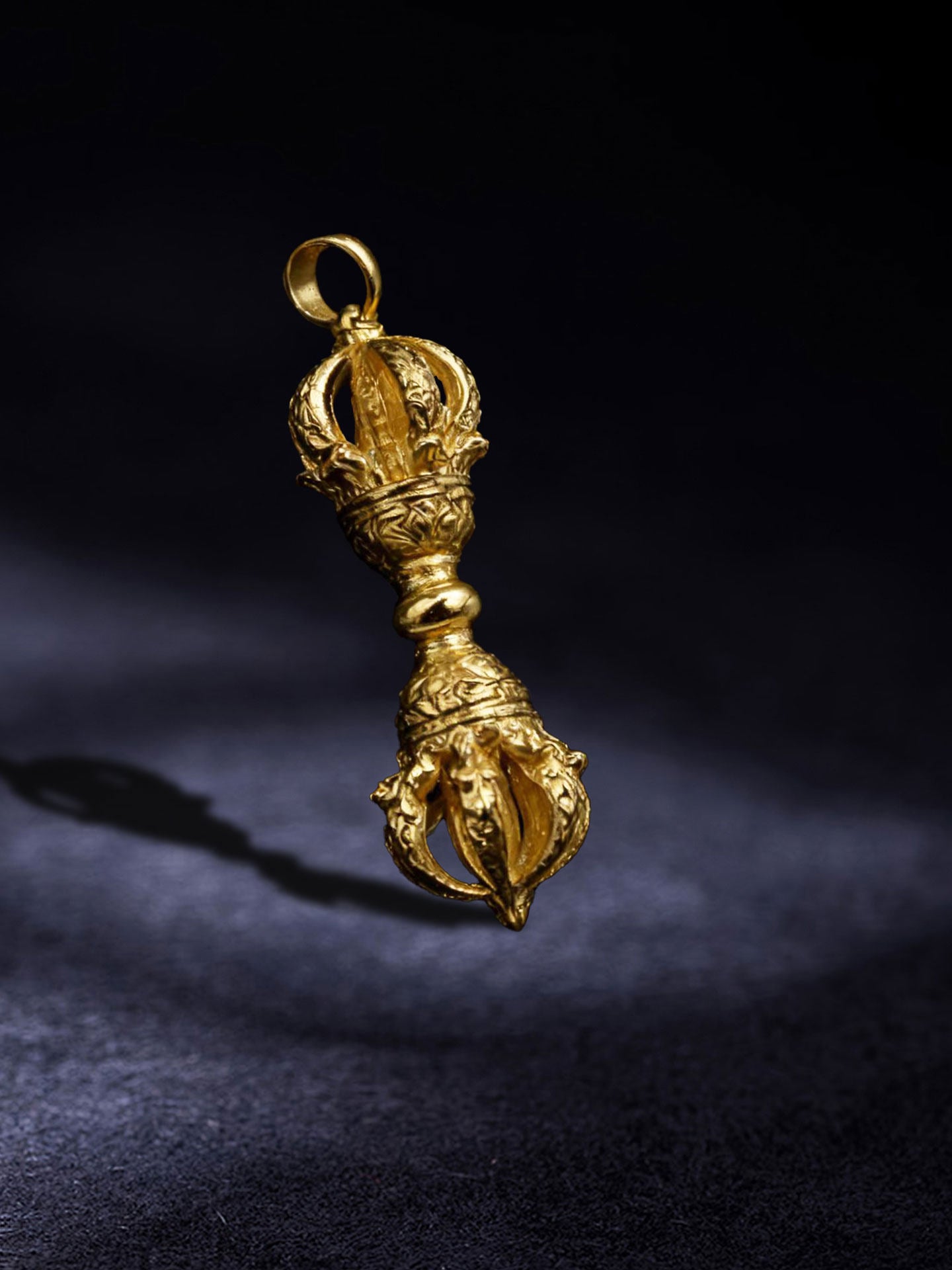 Artisan-crafted gold-plated brass Vajra pestle, a powerful talisman from Tibetan Buddhist sacrificial implements culture for inner peace.