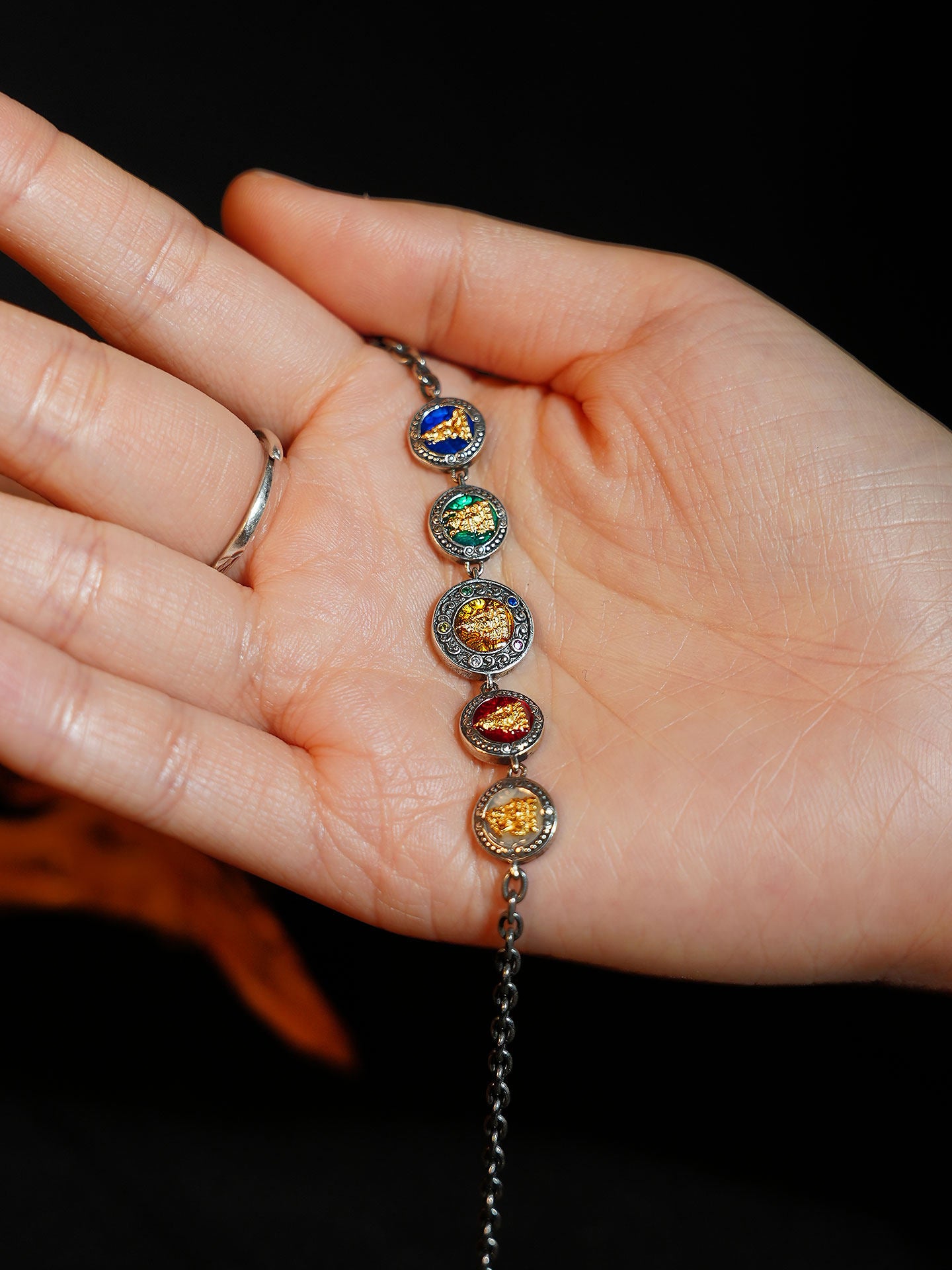 Artisan-crafted 24K gold-over-silver prosperity bracelet inspired by Tibetan Buddhist sacrificial implements culture, designed to attract wealth and merit.