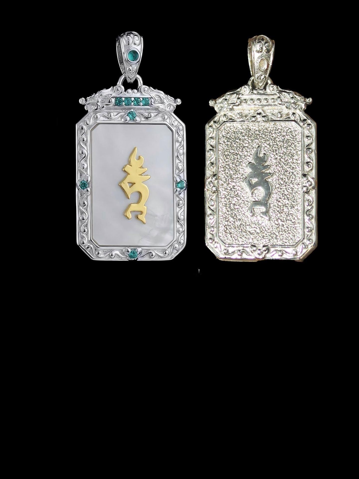 Artisan-crafted 24K gold-plated silver Green Tara amulet inspired by Tibetan Buddhist sacrificial implements culture, symbolizing the Mother of Buddhas.