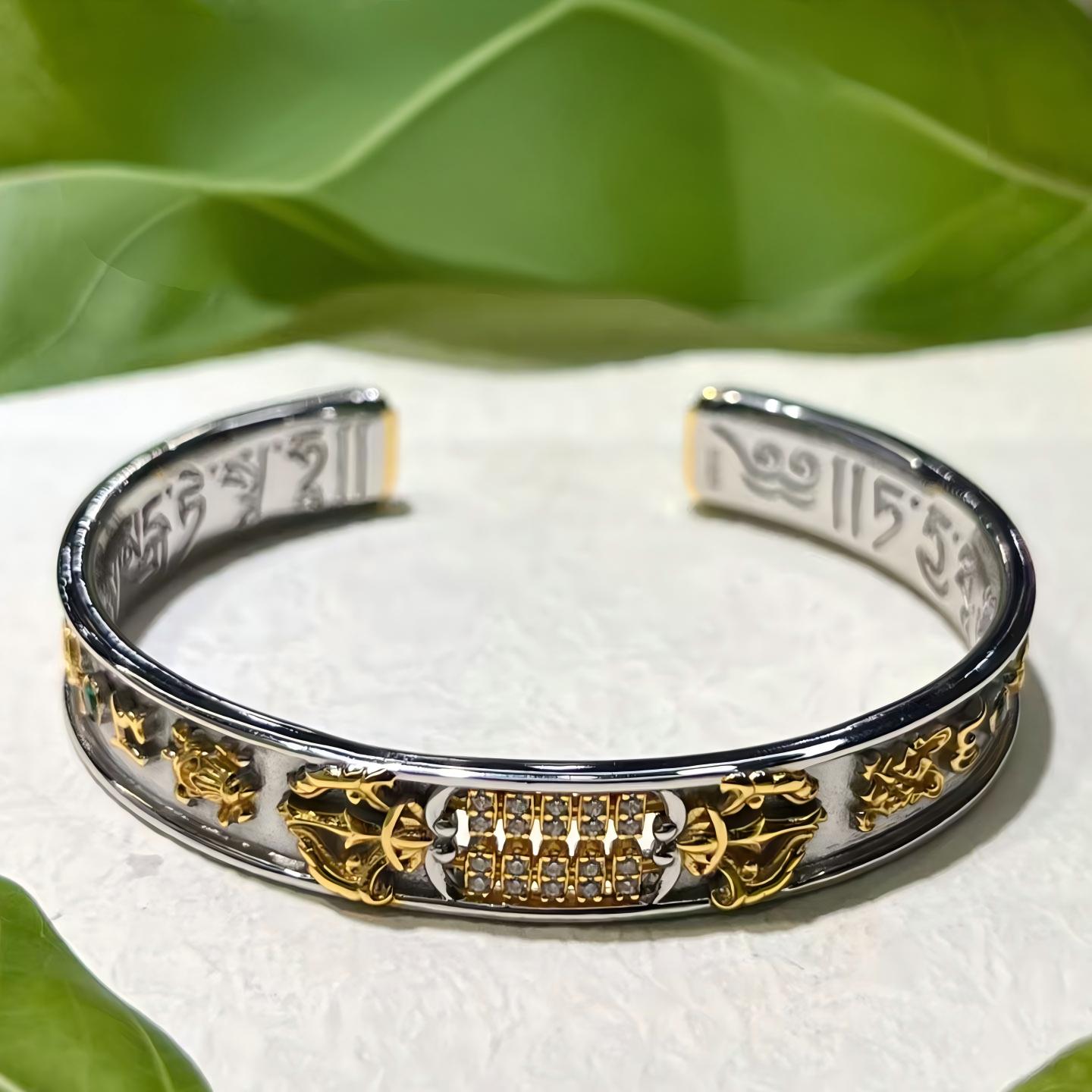 Artisan-crafted 24K gold-over-silver prosperity cuff inspired by Tibetan Buddhist sacrificial implements culture, symbolizing wealth and wisdom.