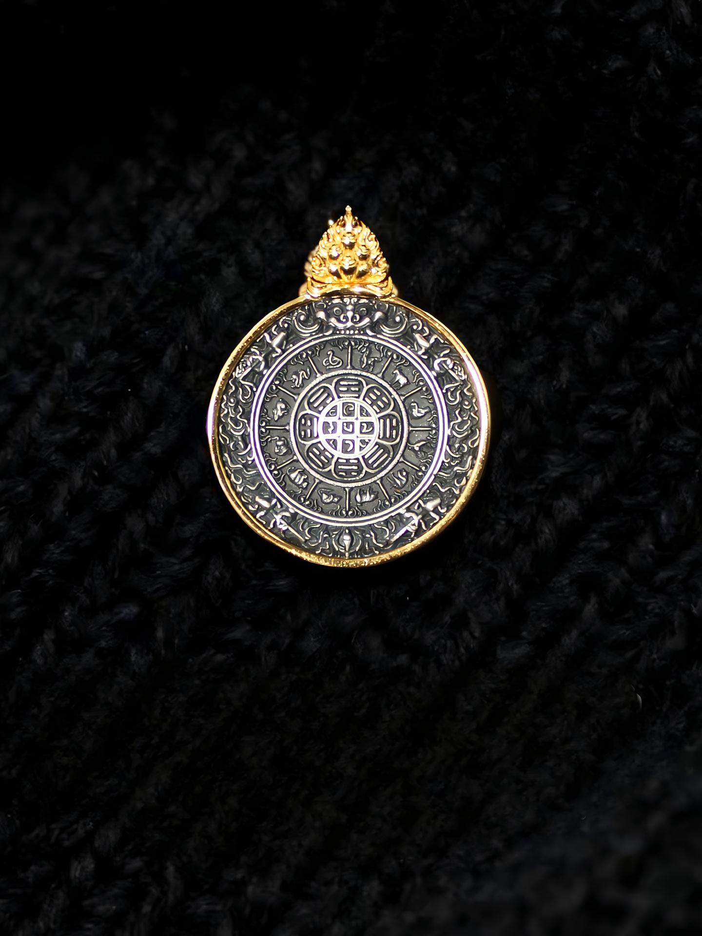 Artisan-carved sterling silver amulet inspired by Tibetan Buddhist sacrificial implements culture, designed to ward off evil and balance energy.