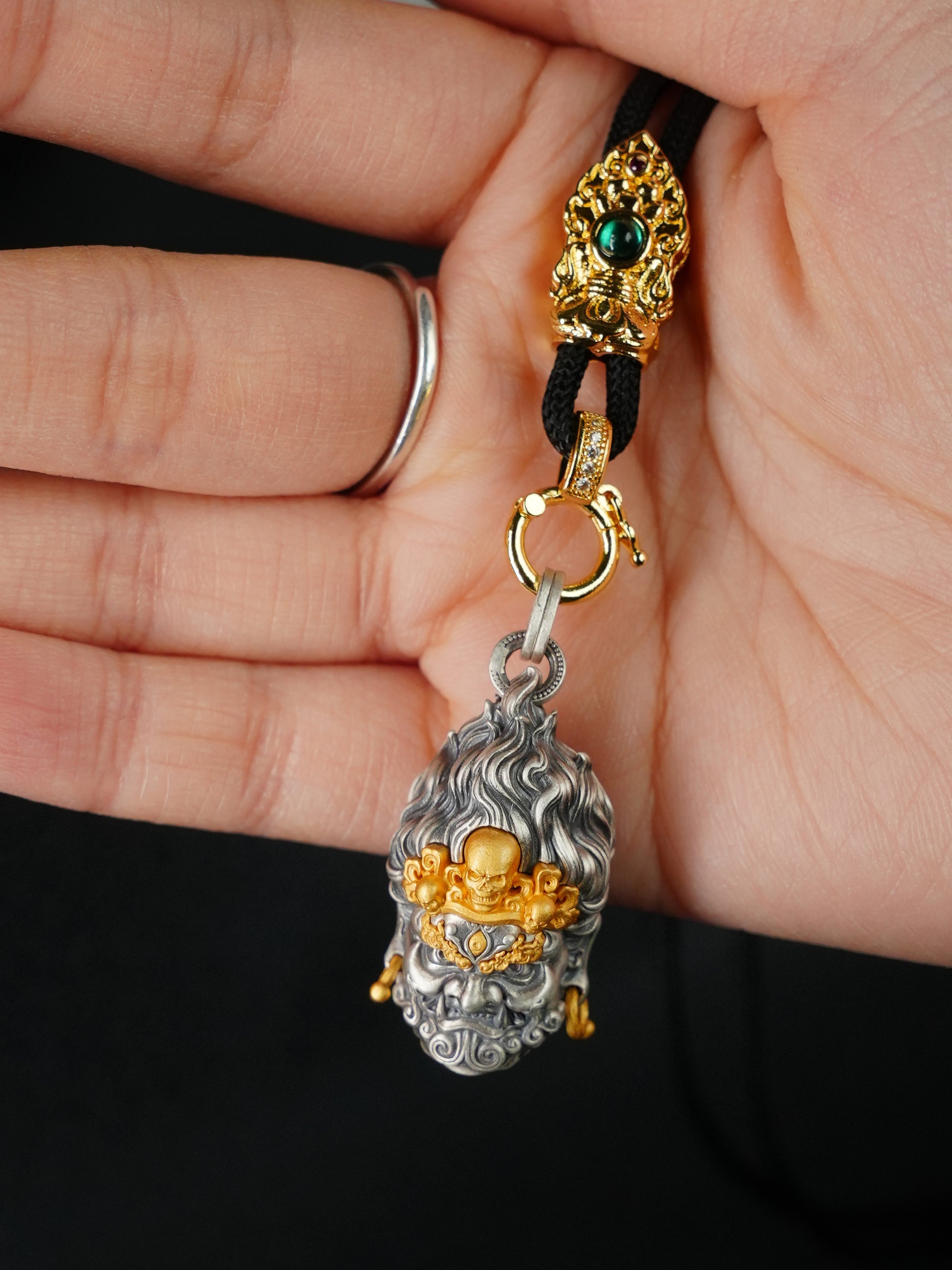 Artisan-crafted 24K gold-plated silver Mahakala amulet inspired by Tibetan Buddhist sacrificial implements culture, symbolizing the destruction of obstacles.