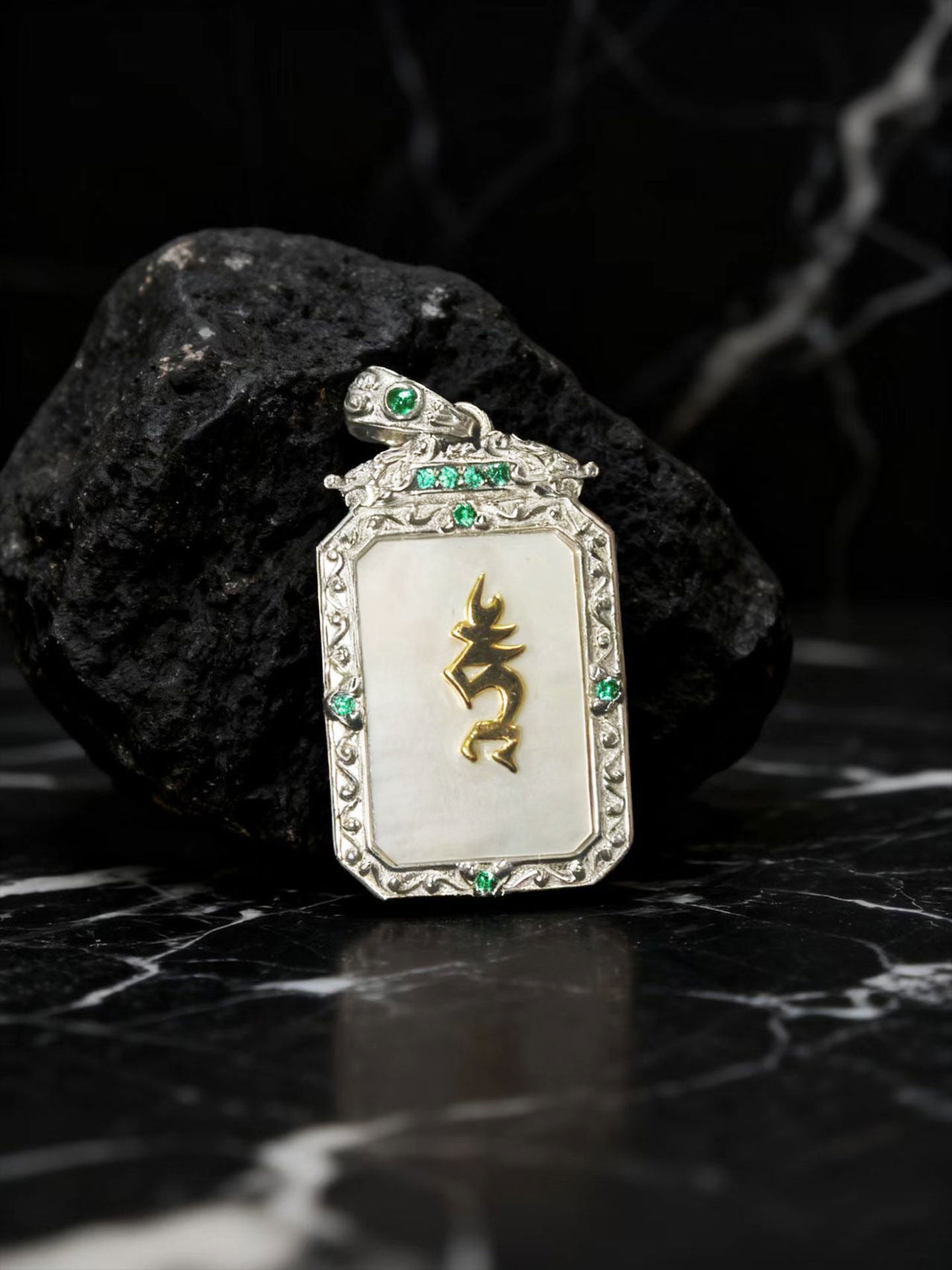 Artisan-crafted sterling silver gilded amulet inspired by Tibetan Buddhist sacrificial implements culture, designed to clear obstacles and fear.