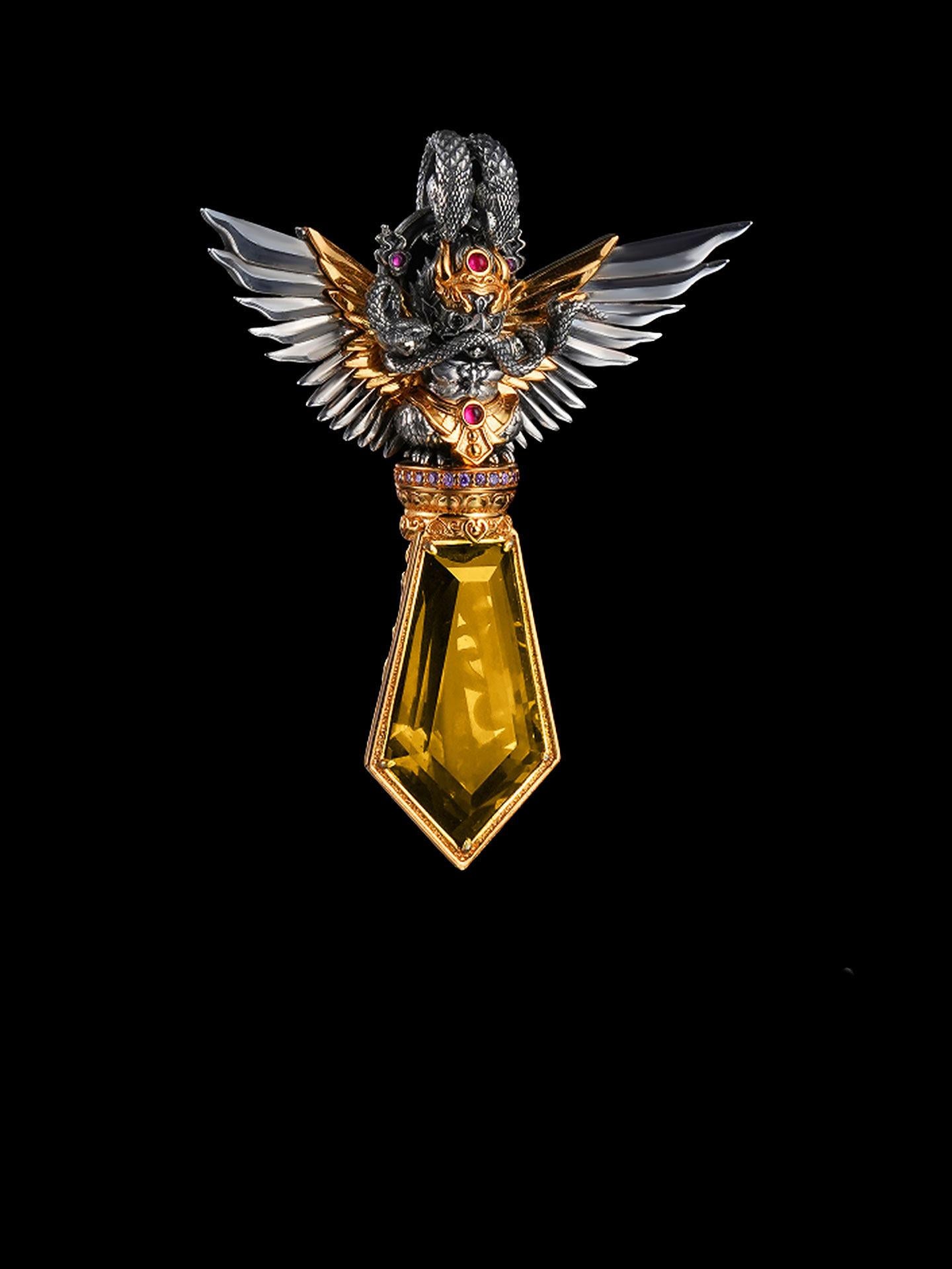 Exquisite Buddhist sacrificial items art featuring a hand-carved silver Garuda bird clutching a vibrant yellow citrine gemstone.
