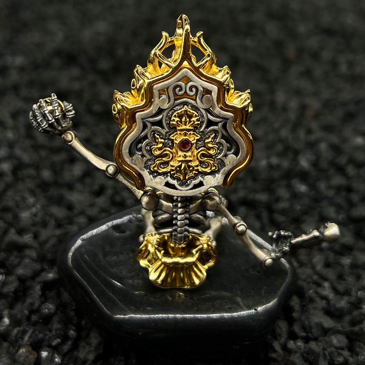 A practitioner wearing the sacred Citipati necklace for dispelling ego and negative energy, representing Buddhist sacrificial items art.