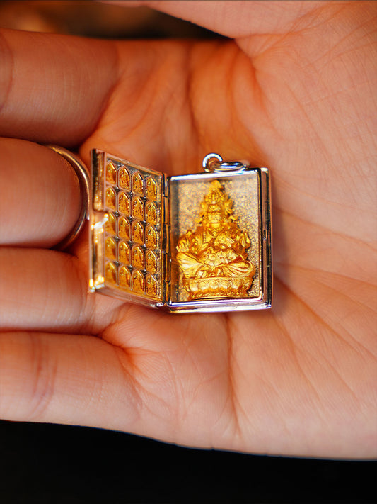 An openable Gau box designed to hold sacred mantras and relics, representing the essence of Buddhist sacrificial items art.