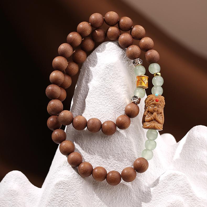 Multi-wrap Tibetan-Buddhist sandalwood mala bracelet symbolizing peace and auspicious blessings