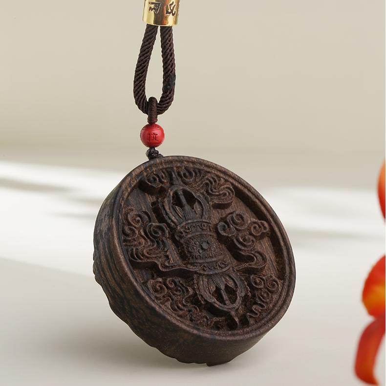 Tibetan Buddhist sandalwood vermilion bead charm, crafted for spiritual balance and protection.

