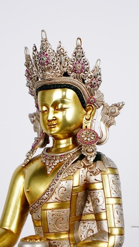 Tibetan Buddhist Shakyamuni Buddha statue silver inlay detail, handcrafted Buddha Statue-Art highlighting fine metalwork and craftsmanship