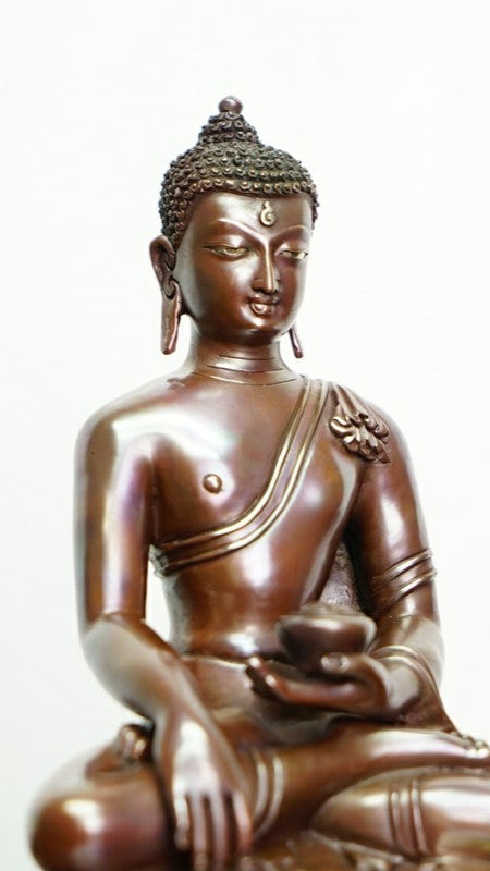 Shakyamuni Buddha Statue made from pure copper and mineral pigments, handcrafted with intricate details, perfect for meditation and spiritual practices.