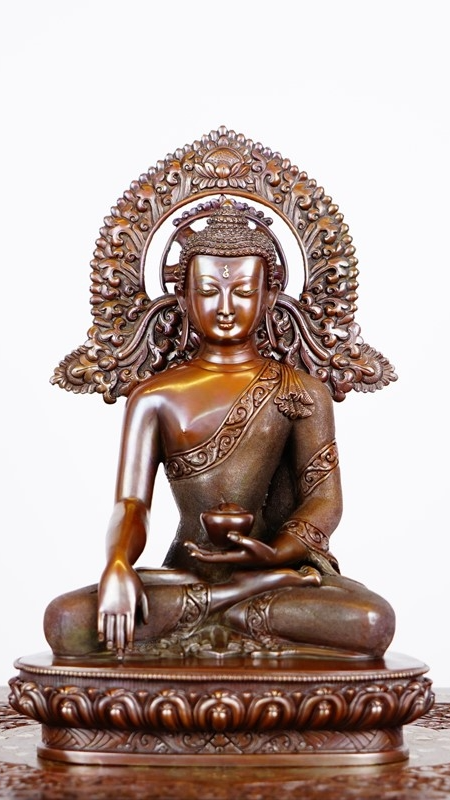 Shakyamuni Buddha Statue made from pure copper and mineral pigments, handcrafted with intricate details, perfect for meditation and spiritual practices.