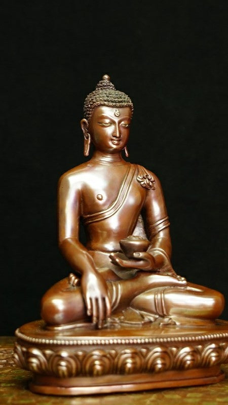 Tibetan Shakyamuni Buddha Statue in copper with mineral pigments, representing peace and wisdom, handcrafted for spiritual reflection and mindfulness.